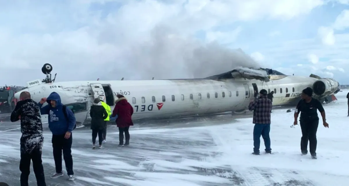 Delta Airlines flight flips over on landing at Toronto's Pearson Airport and 8 people are hurt