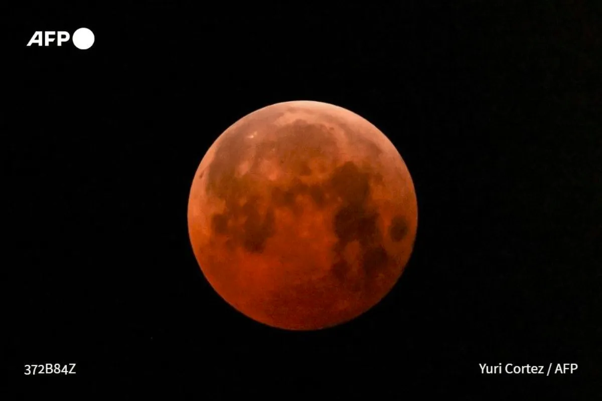 Stargazers marvel at 'Blood Moon', rare total lunar eclipse
