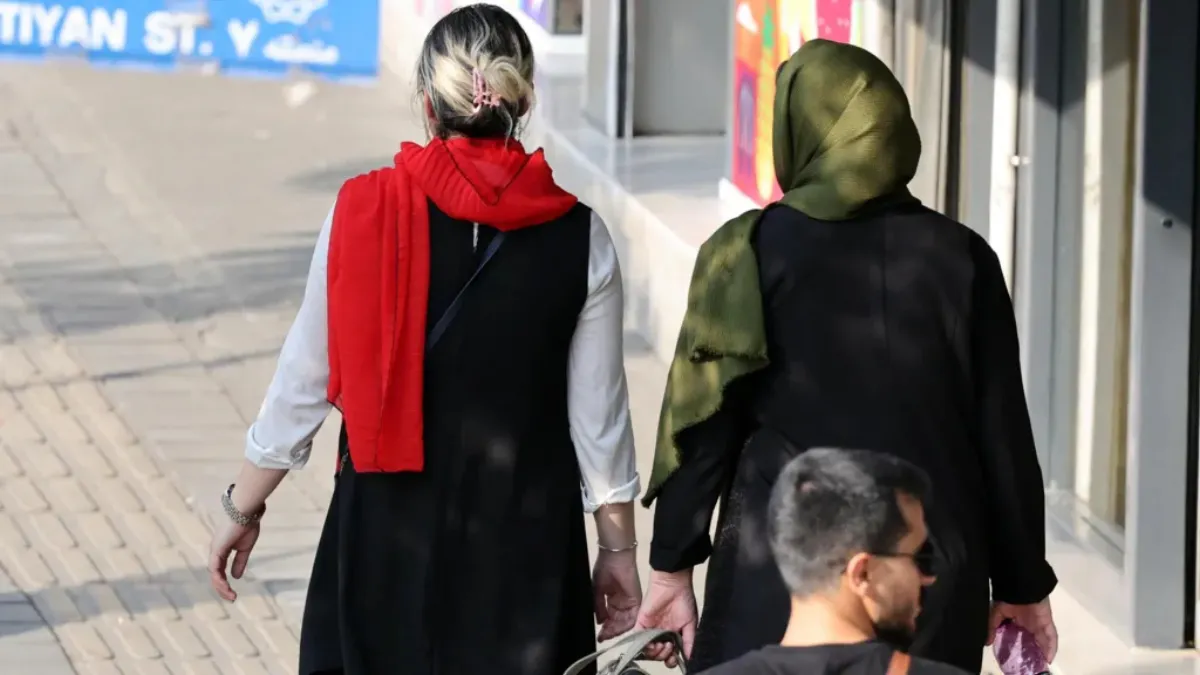 Iran uses electronical surveillance to pressure women into complying with dress code, UN warns 