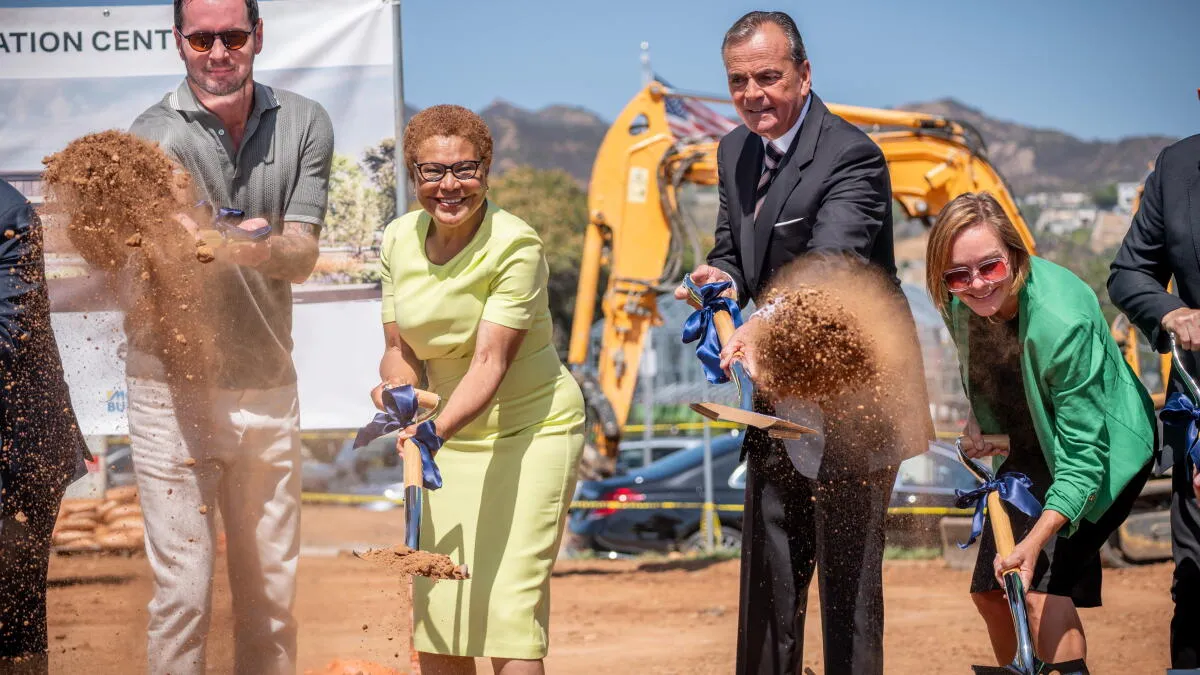 Bass and Caruso Appear Together, Endorsement Remains Unclear